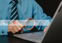 Human use laptop with Search engine optimization SEO networking