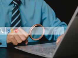 Human use laptop with Search engine optimization SEO networking